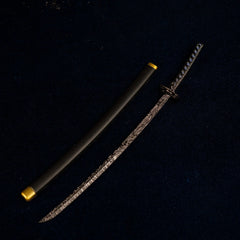 Star Shadow katana metal replica and its black scabbard with gold accents, isolated on a dark background.
