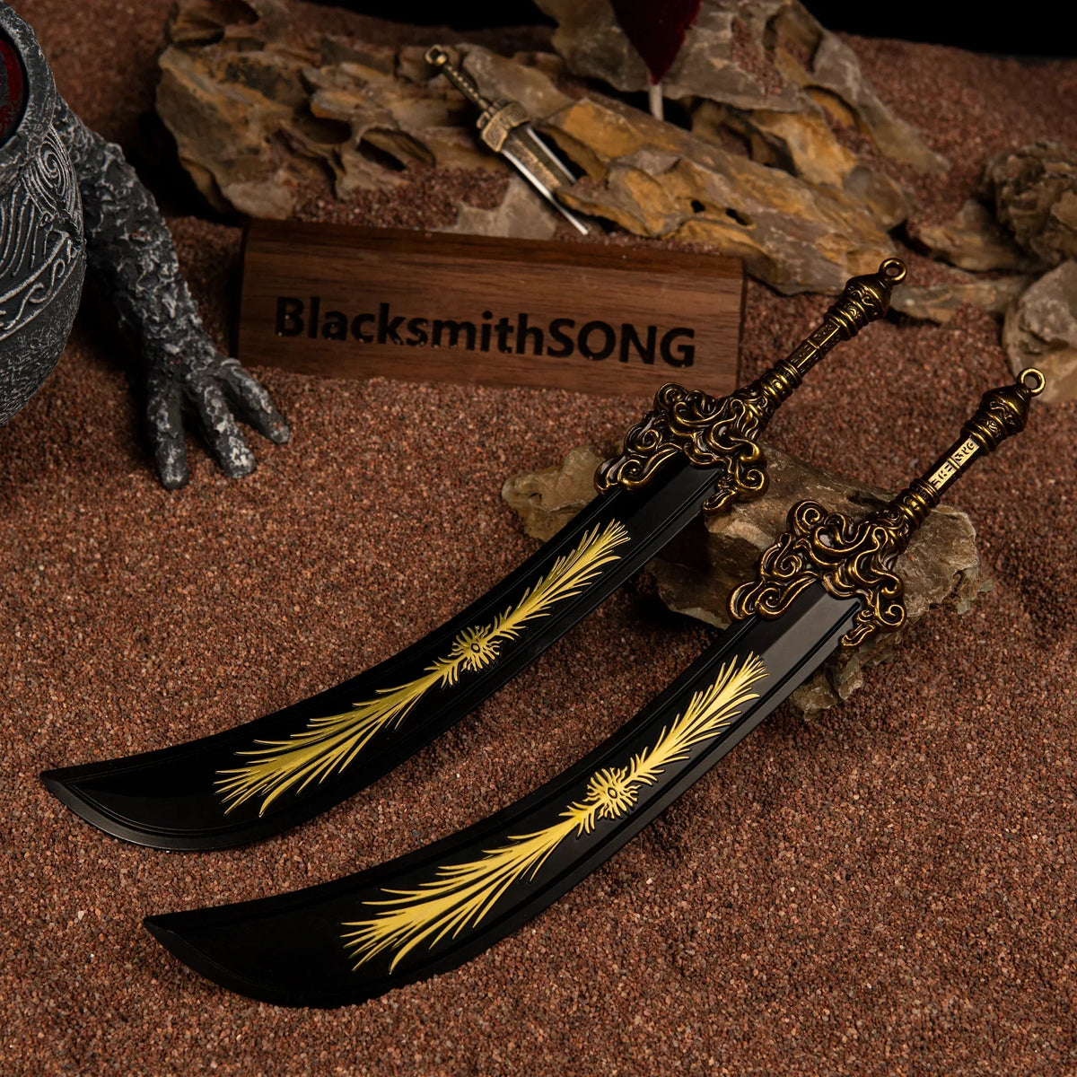 Two Starscourge Greatsword metal miniatures lying parallel on red sand in a battle-themed diorama with dark rocks and a BlacksmithSONG logo.