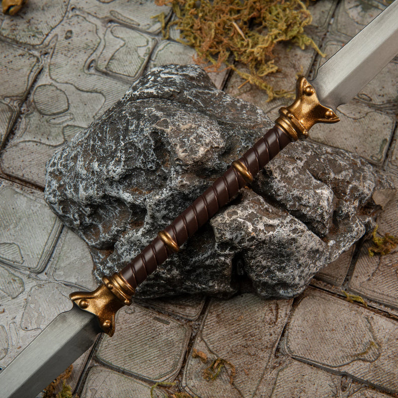 Twinblade replica — wrapped grip and gold end-cap detail close-up.
