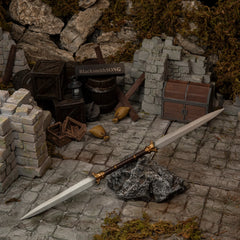 Twinblade replica (30cm die-cast zinc alloy sword) — hero shot in a handcrafted Limgrave ruins diorama, by BlacksmithSONG.