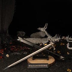 Blackfyre replica — small display stand, low angle across the black sand set.