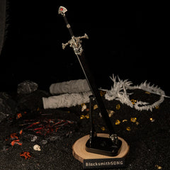Blackfyre replica — standing point-down on the vertical stand.