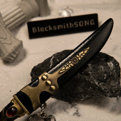 Catspaw Dagger replica — ridged grip and hilt, alternate angle.