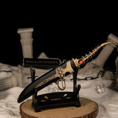 Catspaw Dagger replica — resting on the small display stand.
