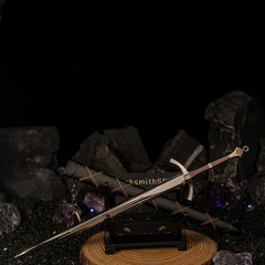 Dawn Sword replica — small stand with the sword set in an alternate position.