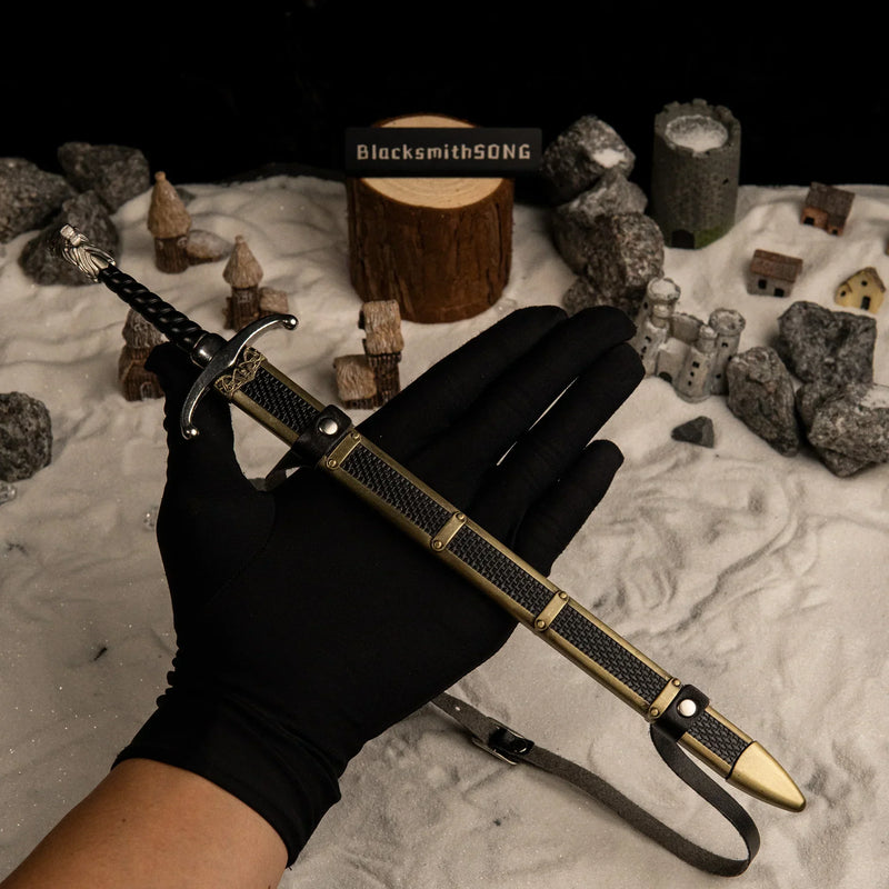 Longclaw replica (30cm die-cast zinc alloy sword) — held in hand for scale. 