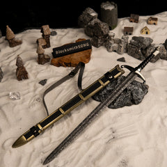 Longclaw replica (30cm die-cast zinc alloy sword) — hero shot beside its scabbard in a snow diorama, by BlacksmithSONG.