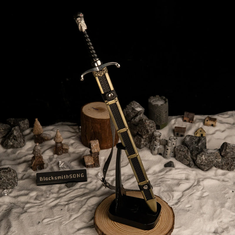 Longclaw replica — standing point-down on the vertical stand.