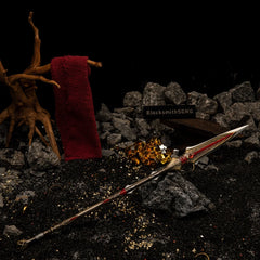 Draupnir Spear replica — second angle in the handcrafted mining forge set with gold ore and loose rings.