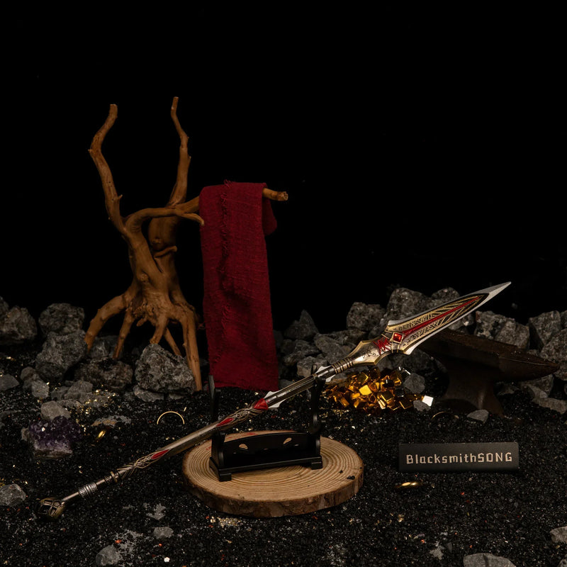 Draupnir Spear replica — displayed on the small stand near the gold ore cluster.