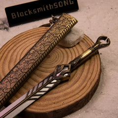Ingrid replica — hilt and guard detail close-up on a wood display base.