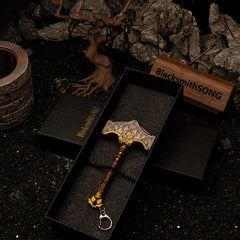 Mjolnir replica — in its foam-lined gift box packaging.