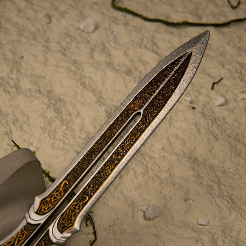 Blade of Olympus replica — blade and gold filigree fuller close-up.