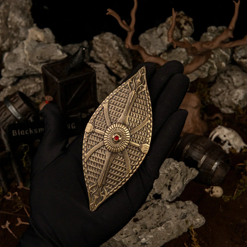 Dauntless Shield replica (12.5cm die-cast zinc alloy shield) — held in hand for scale.