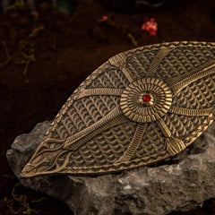 Dauntless Shield replica — center medallion and red gem detail, close-up.