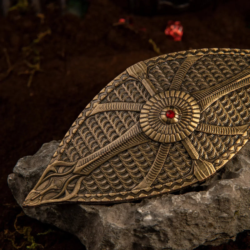 Dauntless Shield replica — center medallion and red gem detail, close-up.