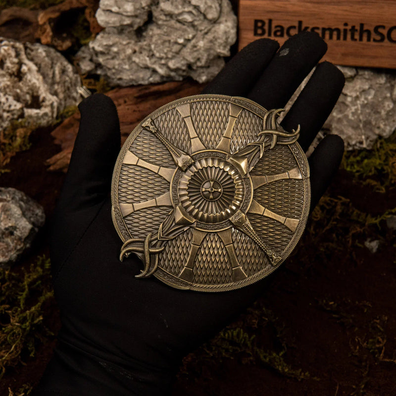 Guardian Shield replica (10cm die-cast zinc alloy shield) — held in hand for scale.