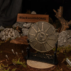 Guardian Shield replica — displayed on the large stand among the rocks and arrows.