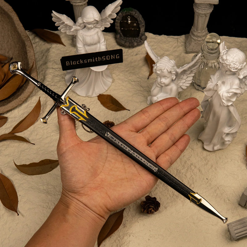 Andúril replica (30cm die-cast zinc alloy sword) — held in hand for scale.