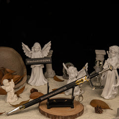 Andúril replica — resting on the small display stand against a dark backdrop.