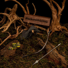 Bow of the Galadhrim replica (18cm die-cast zinc alloy bow) — laid with its matching arrow in a woodland root set, by BlacksmithSONG.