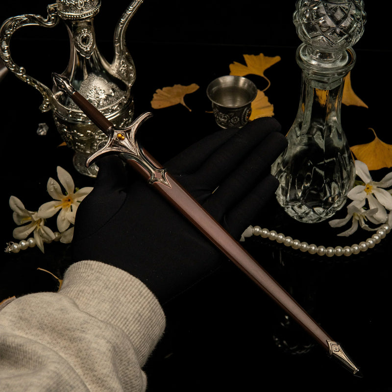 Galadriel Sword replica (30cm die-cast zinc alloy sword) — held in hand for scale.