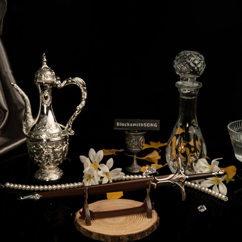 Galadriel Sword replica — angled view on the large display stand against the glass floor.