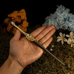 Galadriel's Dagger replica (22cm die-cast zinc alloy dagger) — held in hand for scale.