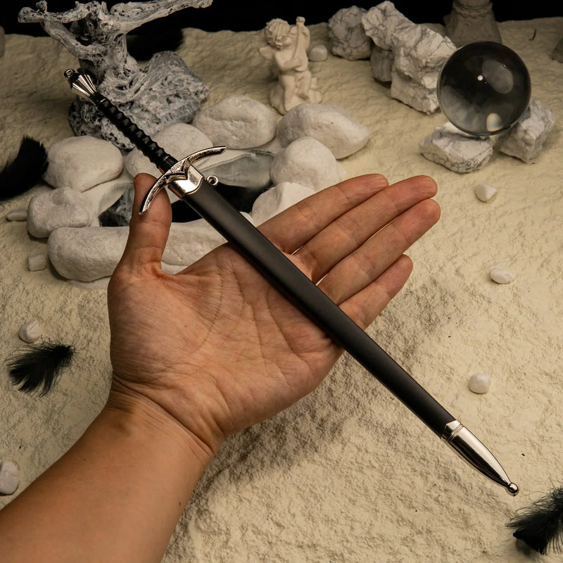 Glamdring replica (30cm die-cast zinc alloy sword) — held in hand for scale.