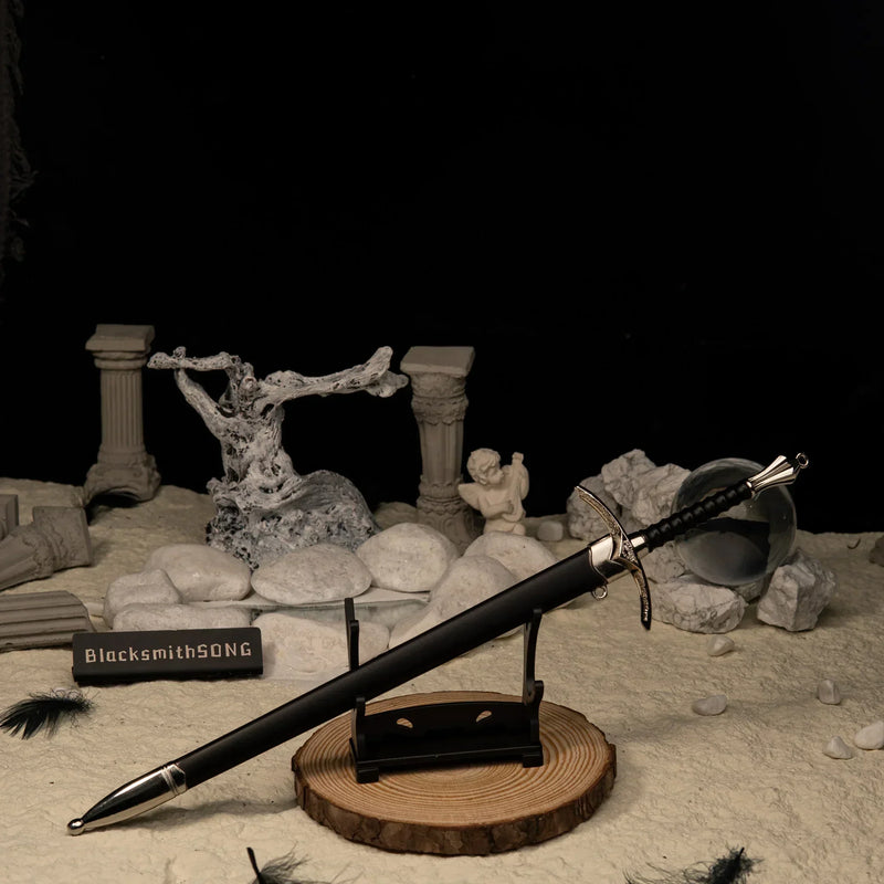 Glamdring replica — set on the small display stand with its round wooden base.