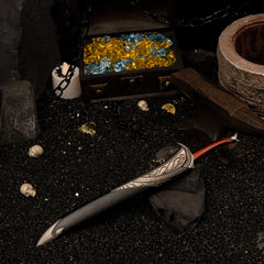 Orcrist replica — wider view of the handcrafted hoard set with a gem-filled chest and hanging chains.