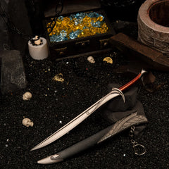Orcrist replica (21cm die-cast zinc alloy sword) — drawn beside its scabbard in a coal-black treasure hoard set, by BlacksmithSONG.