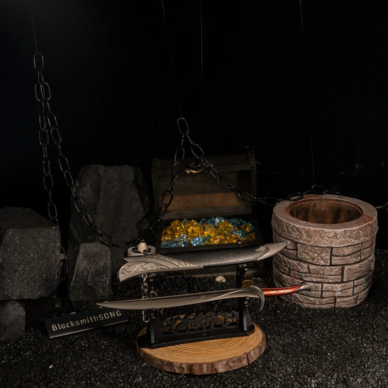Orcrist replica — angled view on the large display stand against the dark hoard backdrop.