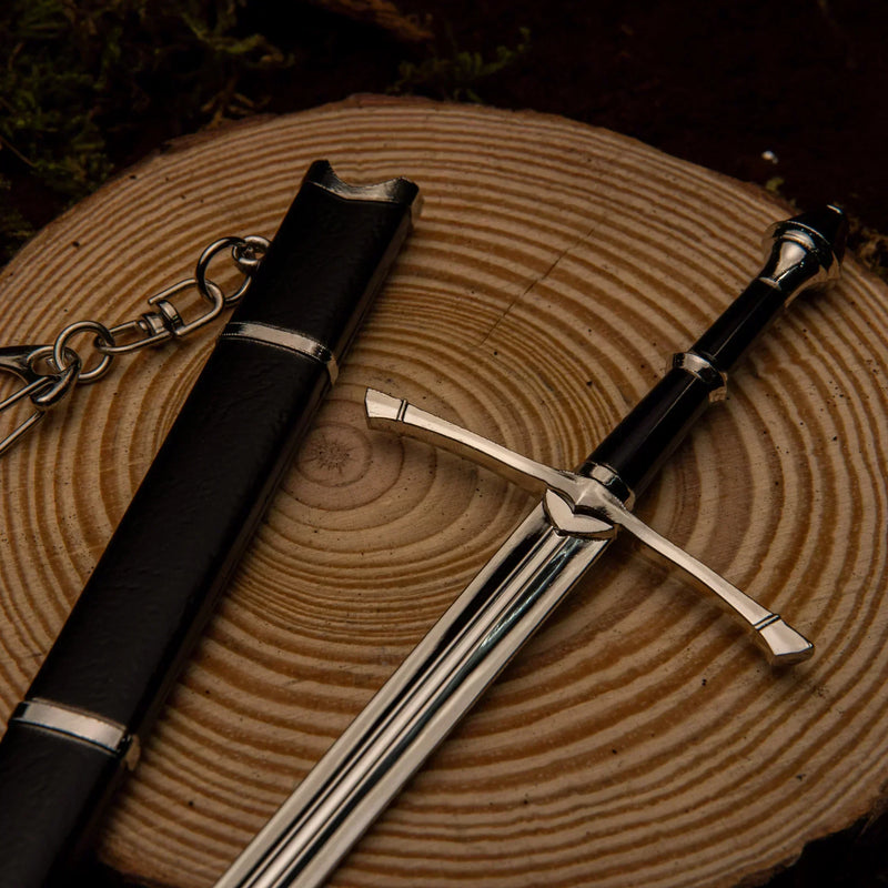 Ranger Sword replica — plain crossguard and wrapped grip crossed over the scabbard's ring and chain.