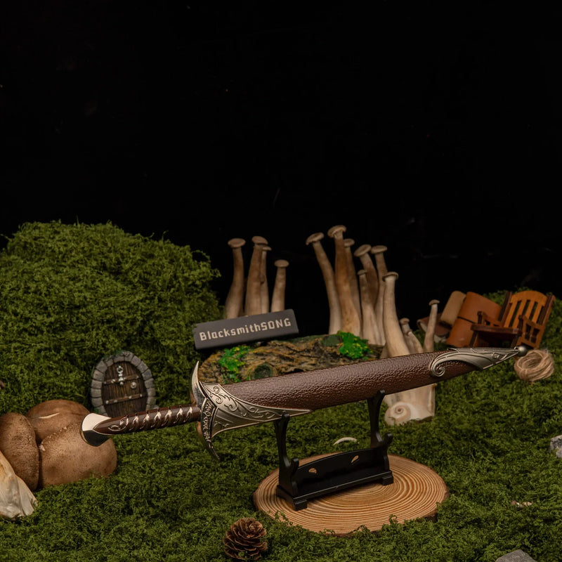 Sting replica — set on the small display stand in the mossy set.