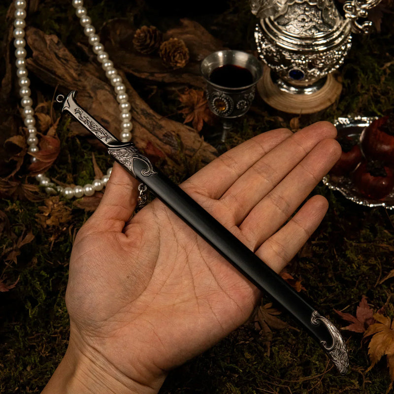 Thranduil's Sword replica (22cm die-cast zinc alloy sword) — held in hand for scale.