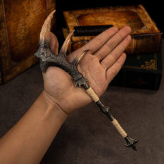 Fatalis Zaggespanon replica (27cm die-cast zinc alloy long sword) — held in hand for scale.