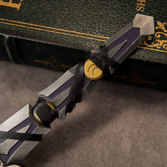 Armageddon replica — layered blade plates, violet inlay and black lacing around a gold medallion.