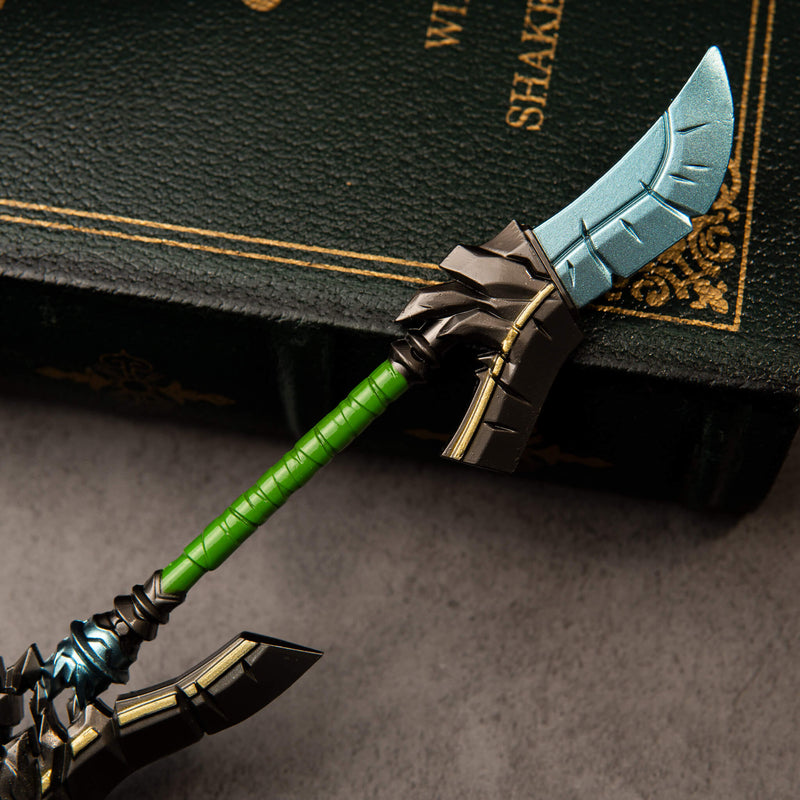 Cloudsong Glaive replica — close-up of the guard, shaft collar and green grip wrap from a lower angle.