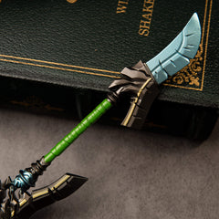 Cloudsong Glaive replica — close-up of the guard, shaft collar and green grip wrap from a lower angle.