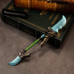 Cloudsong Glaive replica (22cm die-cast zinc alloy polearm) — teal double-bladed glaive on old books, by BlacksmithSONG.