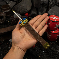Biggoron's Sword replica (20.5cm die-cast zinc alloy sword) — held in hand for scale.