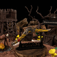 Boomerang replica — displayed on the large stand amid the camp scenery.