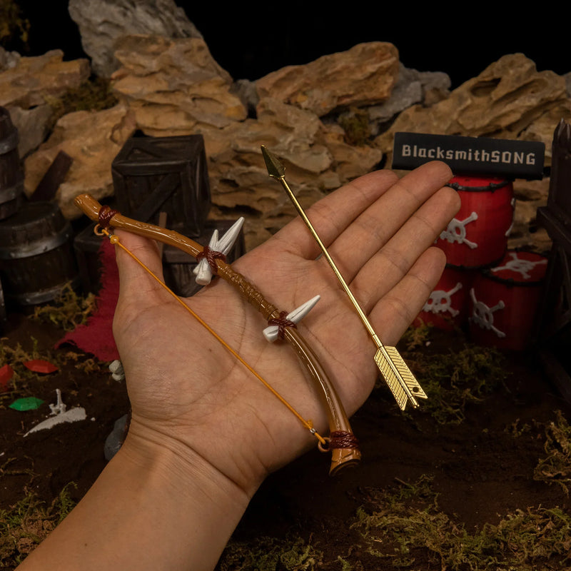 Dragon Bone Boko Bow replica (17.5cm die-cast zinc alloy bow) — held in hand for scale.