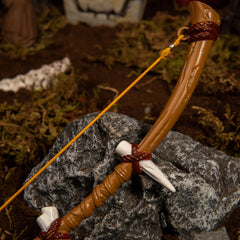 Dragon Bone Boko Bow replica — opposite tip fang and knot detail, close-up.