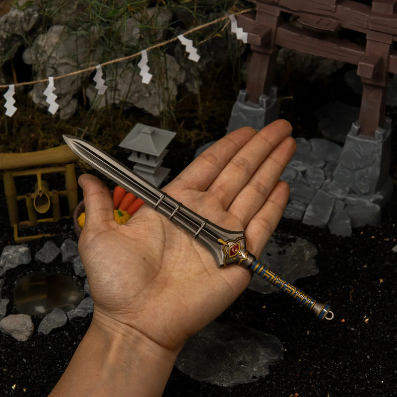 Edge of Duality replica (21cm die-cast zinc alloy sword) — held in hand for scale.