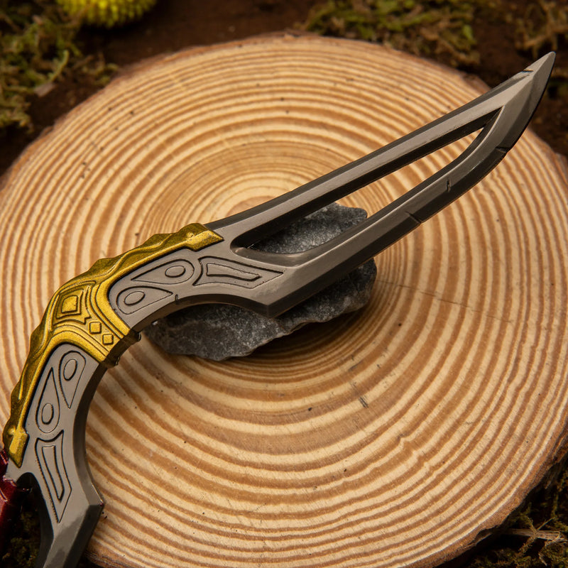 Giant Boomerang replica — etched blade pattern and gold trim close-up on a wood surface.