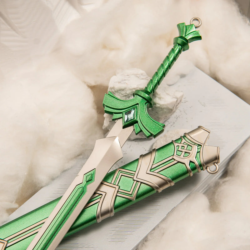 Goddess Sword replica — winged silver guard and green-wrapped grip close-up.