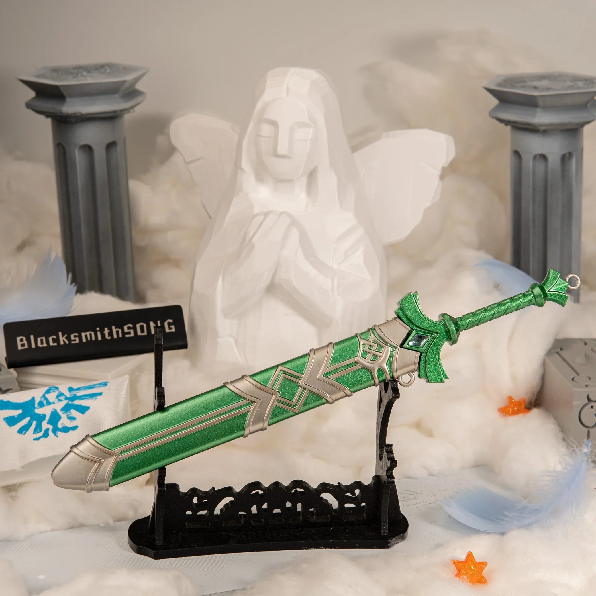 The Goddess Sword and scabbard displayed horizontally on a large black rack, surrounded by white cotton clouds and a miniature Hylian Crest sailcloth.