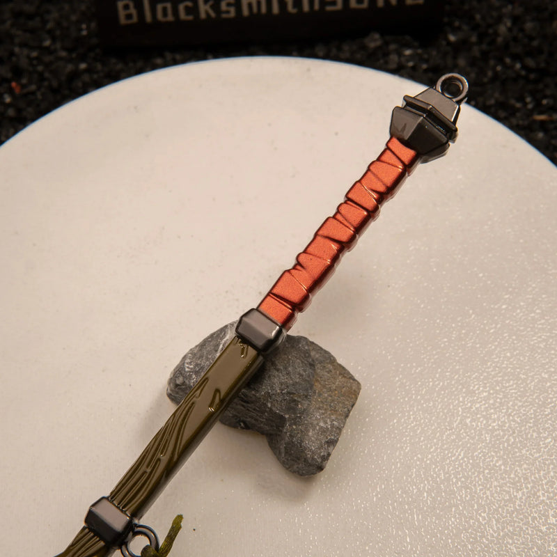 Iron Sledgehammer replica — corded handle wrap and metal ferrule close-up.